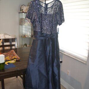 Mother of the Bride Richards , size 20 W Charcoal with a little flaw.